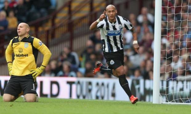 Newcastle striker Yoan Gouffran celebrates his winner against Aston Villa