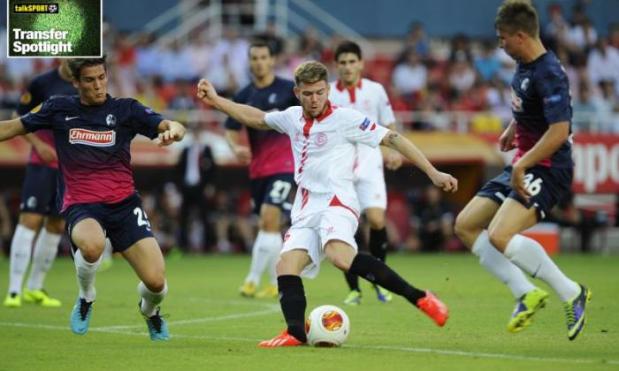 Alberto Moreno (centre) is being tracked by Manchester United