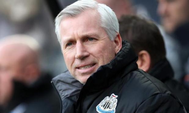 Newcastle boss Alan Pardew looks on