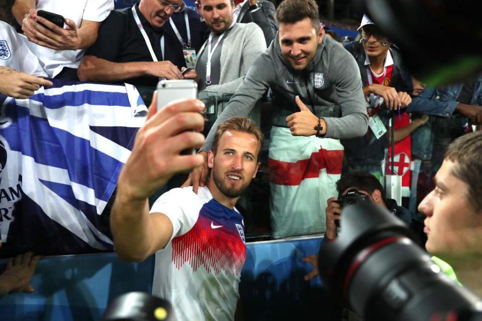  England captain Kane celebrates with some fans after the win over Colombia