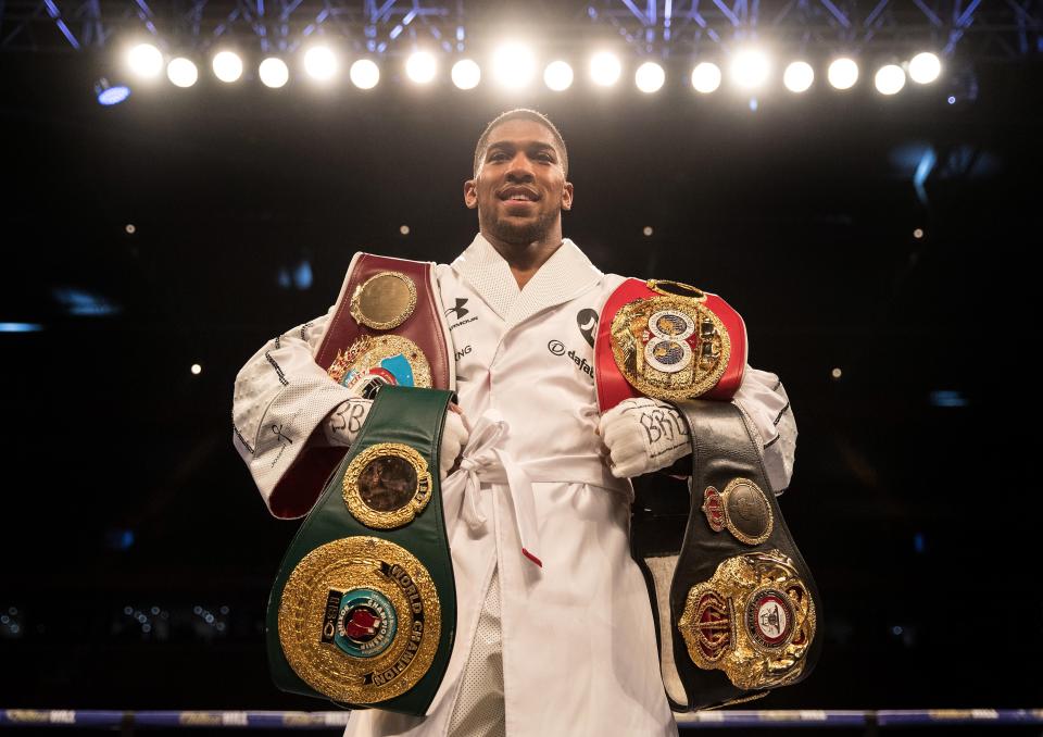  Anthony Joshua holds the WBA, IBF and WBO titles