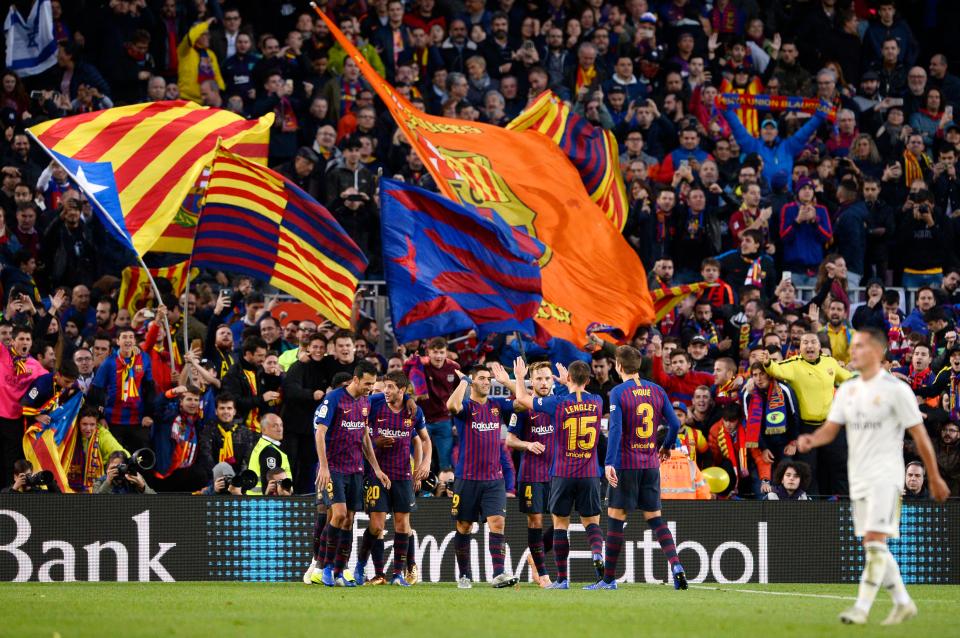  Barcelona stars celebrate one of their five goals