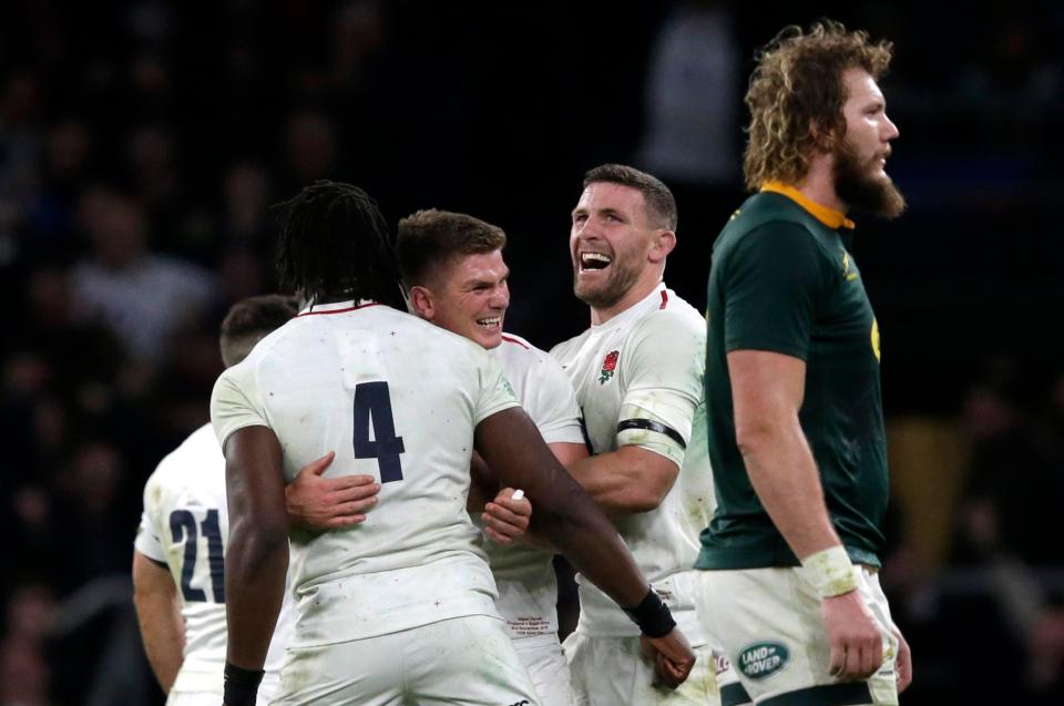 Owen Farrell celebrates England's narrow win his teammates