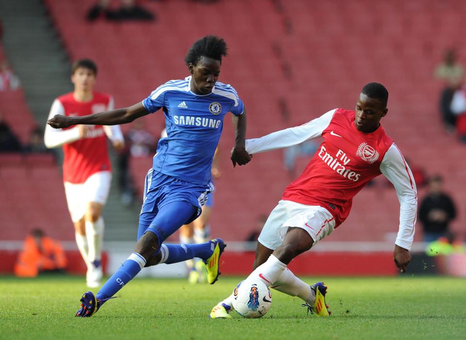  Questions have been raised over Chelsea's deal to sign Bertrand Traore, pictured above playing for Chelsea before his 18th birthday