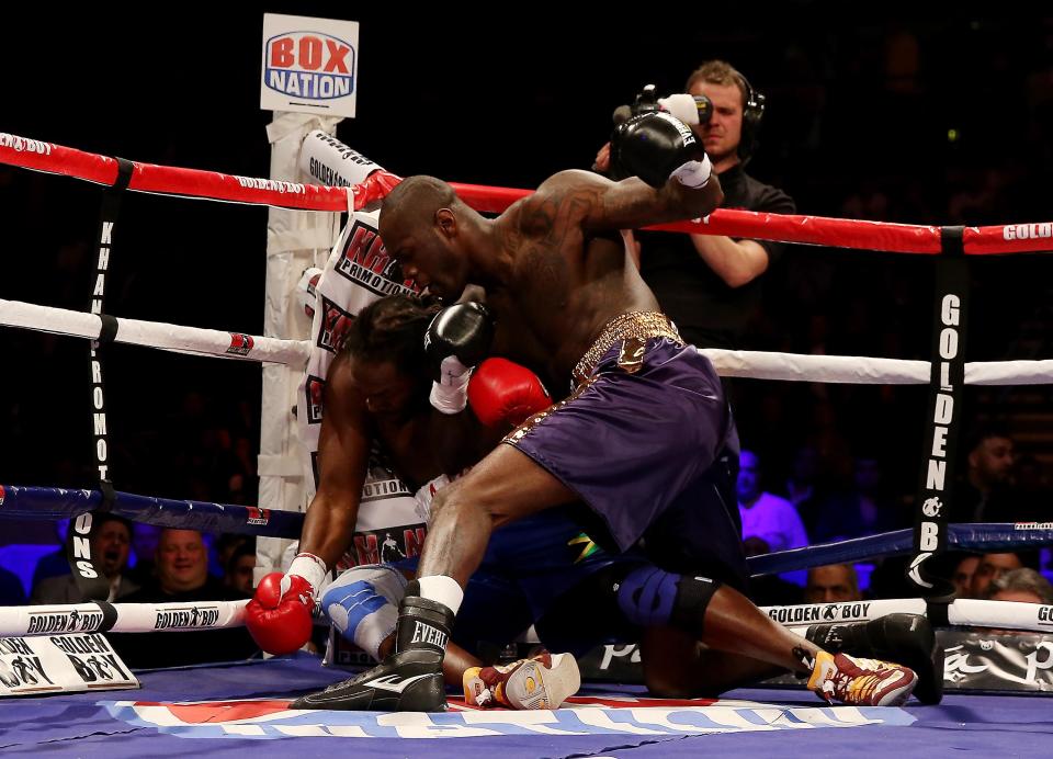 Wilder piles the pressure on Harrison before the referee intervened