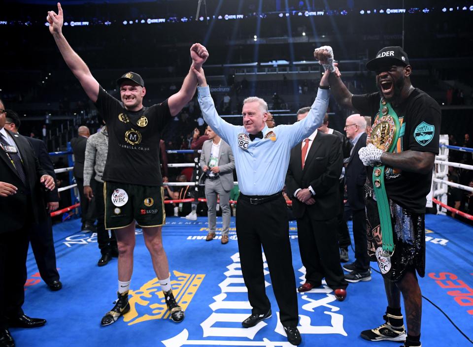  Fury and Wilder both have their hands raised