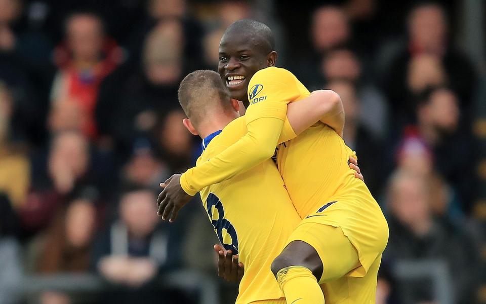  N'Golo Kante celebrates with Ross Barkley