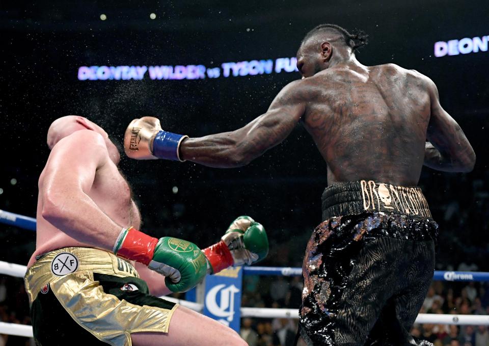  Wilder brutally knocked Fury down in the final round