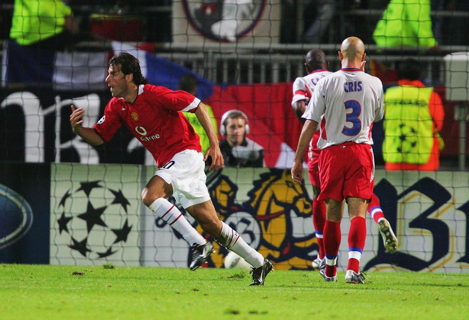  Ruud van Nistelrooy wheels away in celebration after scoring against Lyon