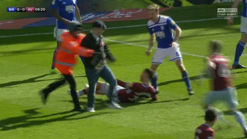  The man was restrained by a steward as it happened