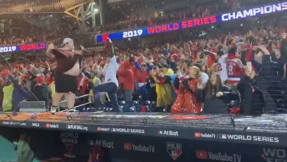  In the euphoria of seeing his team become world champions, the fan rips off his shirt