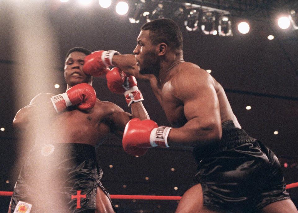  Tyson beat Berbick to win the WBC heavyweight title