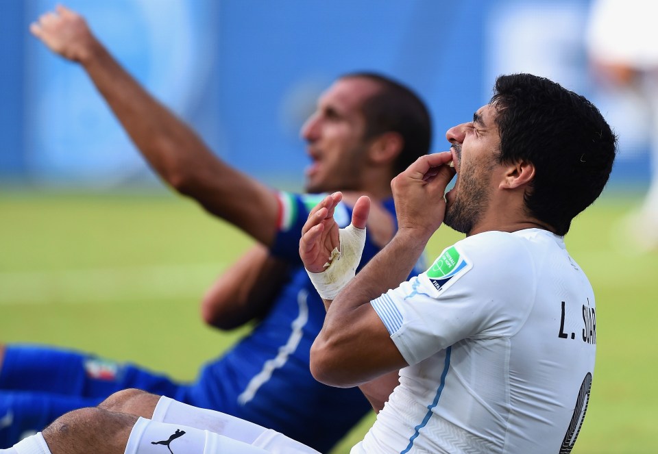  Suarez was hit with a four-month ban from all football for biting Chiellini