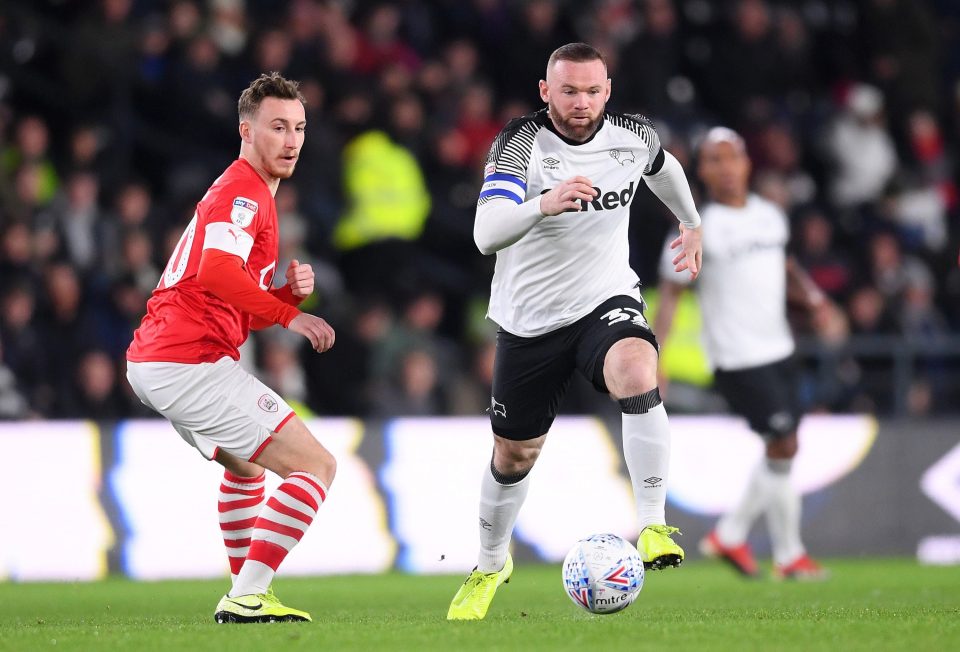  As well as being a player, Wayne Rooney also has a coaching role at Derby