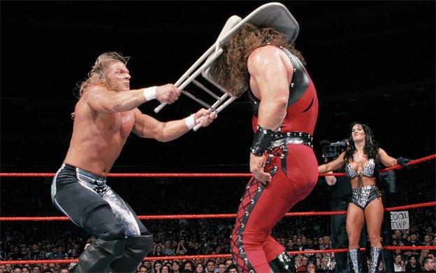  Triple H assaulted Kane with a chair after being disqualified
