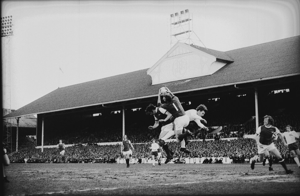  Arsenal goalkeeper Bob Wilson makes a save against Tottenham Hotspur at White Hart Lane, in 1971 as the Gunners won the title