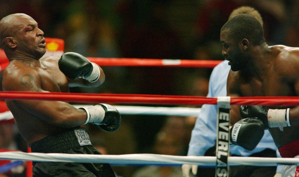  Williams stunned 38-year-old Tyson with a fourth-round knockout