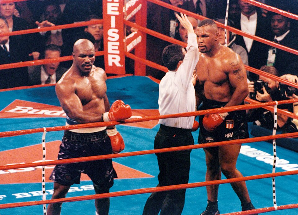 Mike Tyson was disqualified for biting Evander Holyfield's ear in their 1997 rematch