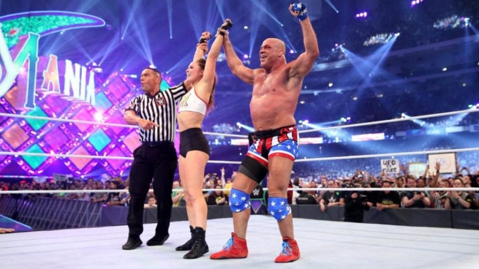 But Lynch attributed that to the skill of WWE icons Kurt Angle Triple H