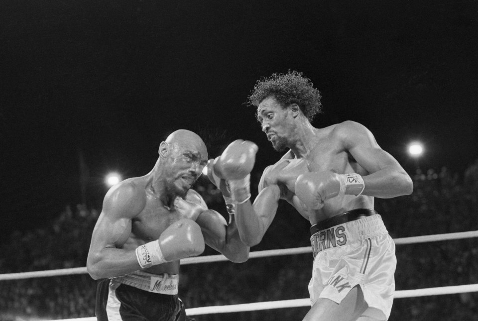 Marvin Hagler and Hearns, right, produced an electrifying fight in 1985, which has since been dubbed 'The War' but equally impressive was the sheer power of 'Hitman'