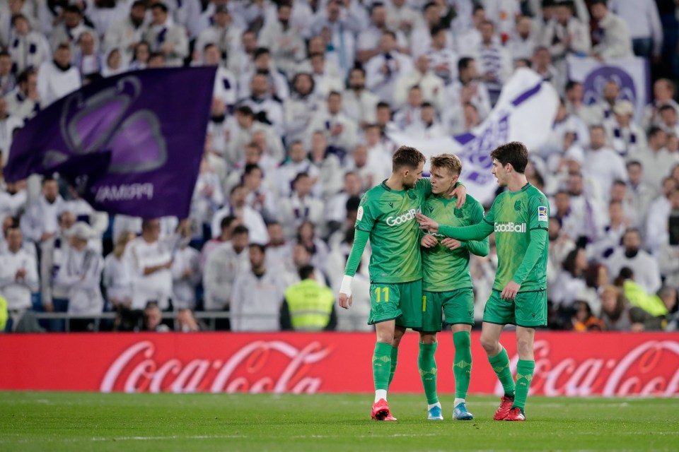  Odegaard (middle) refused to celebrate after he had scored against Real Madrid last February