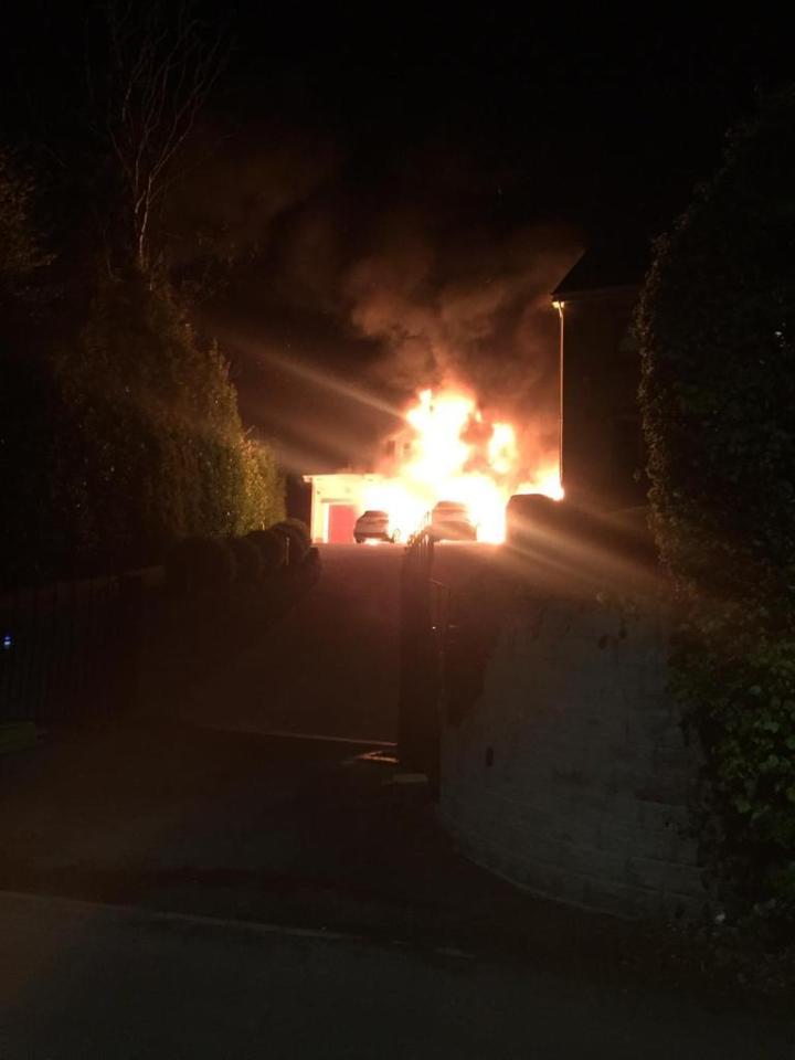 Cars were set on fire, allegedly by a petrol bomb