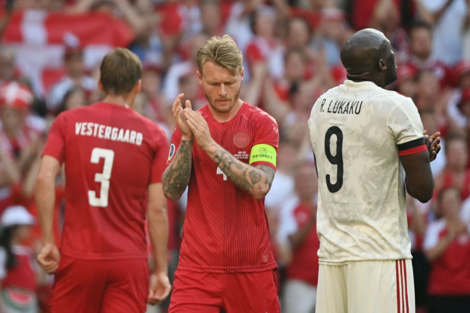 The Denmark and Belgium players all stopped to pay tribute to Eriksen