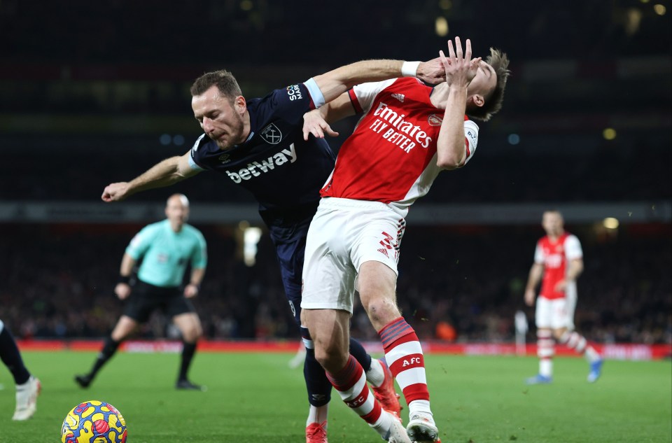Coufal's first yellow was similarly controversial with Kieran Tierney making the most of a high arm