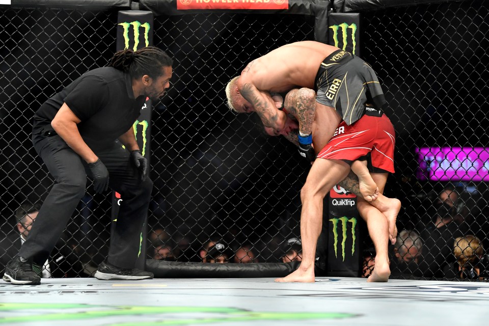 A standing rear-naked choke got the job done for Oliveira against Poirier