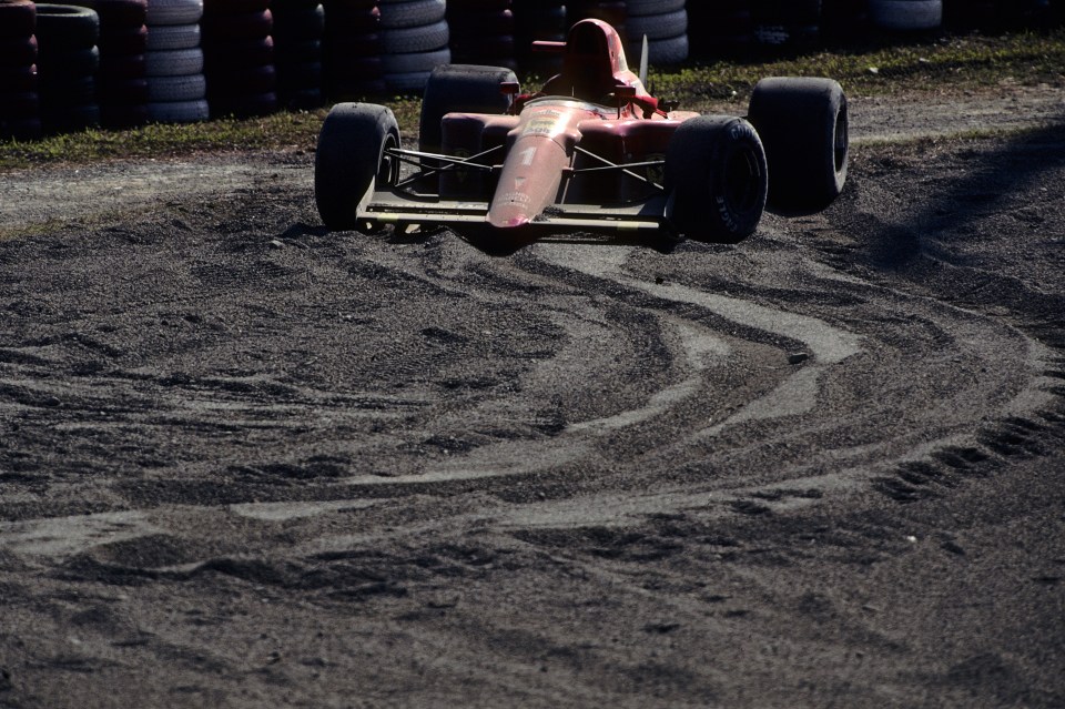 Prost's Ferrari was left in a heap, handing the title to Senna