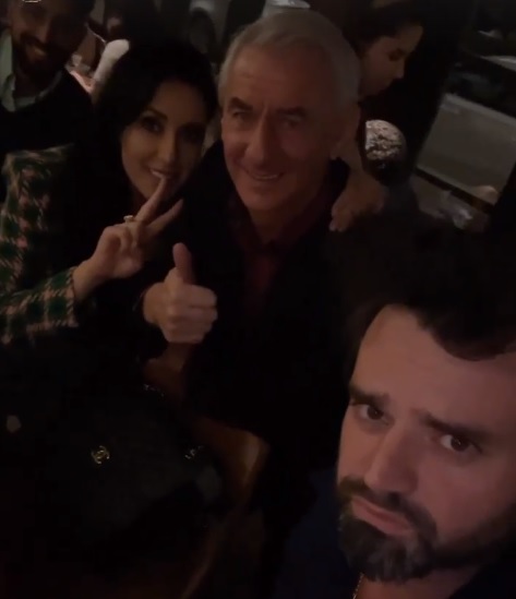 Rush was pictured with Salah's agent Abbas, right