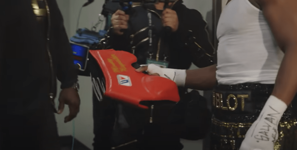 Floyd Mayweather finds a spare cup for Conor McGregor