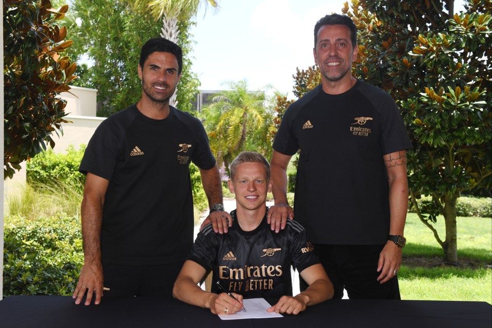 Arteta and Edu pose with new signing Zinchenko - Arsenal's second signing from Premier League champions Man City this summer