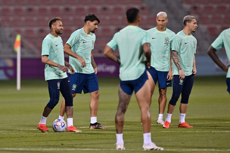 Brazil begin their charge to win a sixth World Cup against Serbia