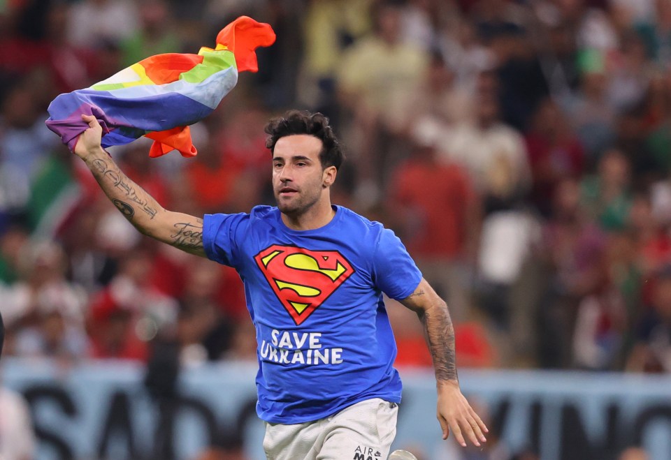A supporter made his way onto the pitch
