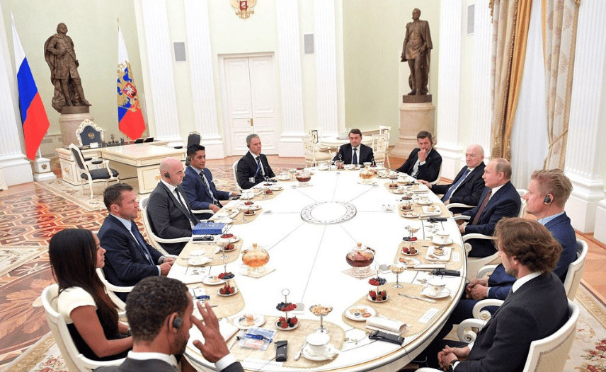 Photos from a meeting with Putin helped Scott escape the ordeal