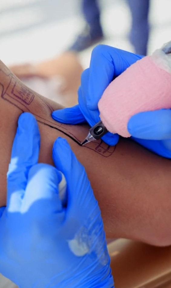 Paul was challenged to get an Au Vodka tattoo in exchange for $250,000 and gladly accepted