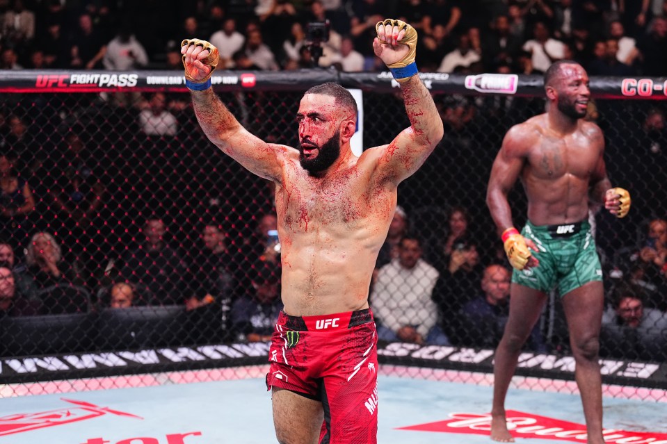 Belal Muhammad celebrates his UFC welterweight championship victory.