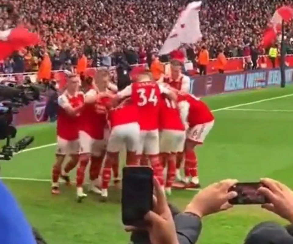 Zinchenko celebrated White's goal with the rest of his teammates