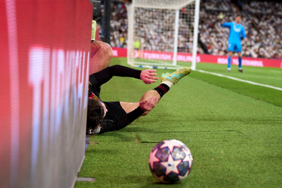 The England ace then went flying into the advertising boards