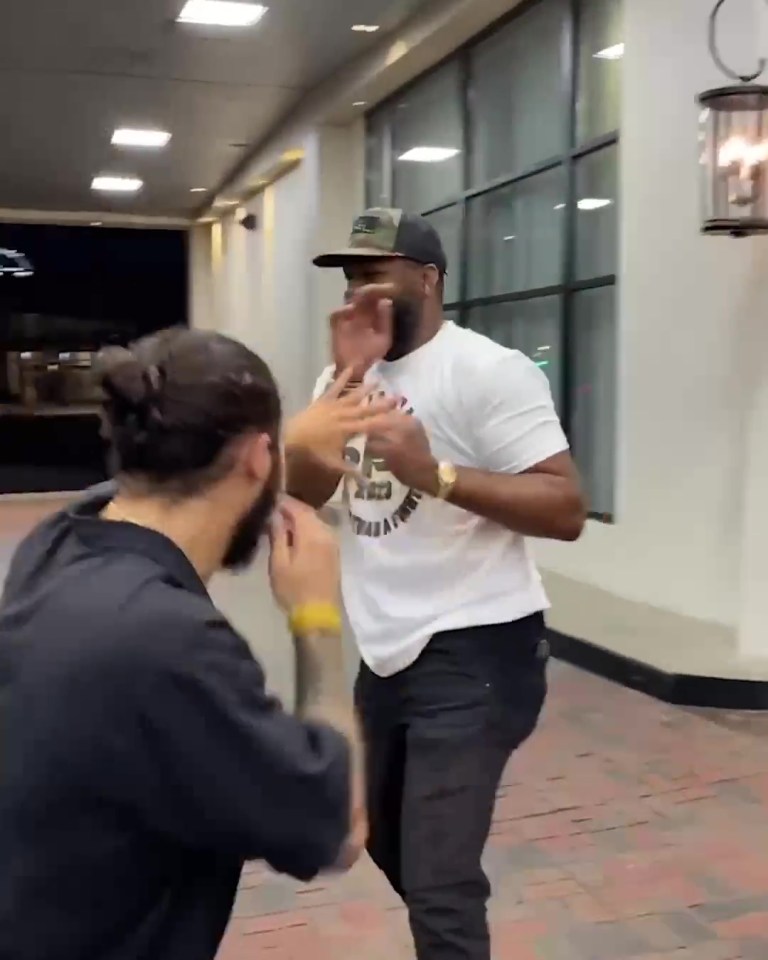 Jones and Walsh jokingly traded punches during a light-hearted spar