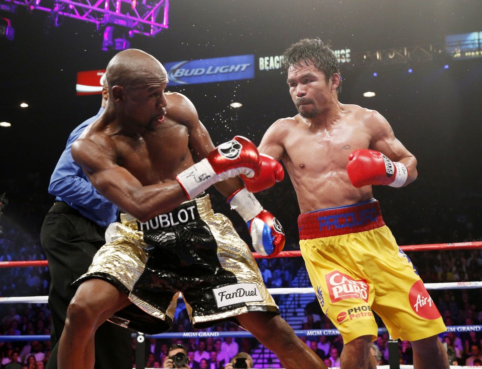 Floyd Mayweather Jr. and Manny Pacquiao boxing.