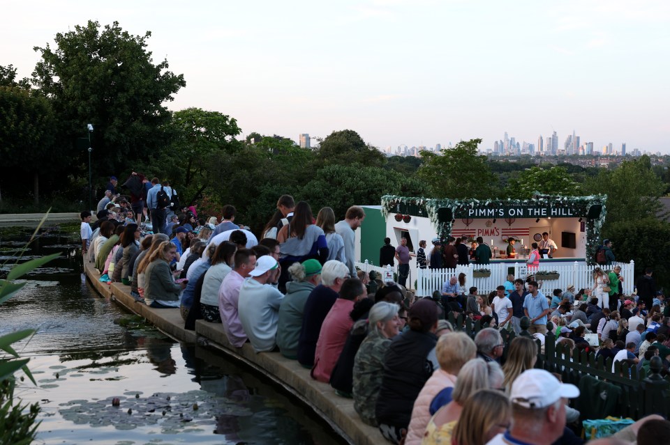 The grounds were packed to see Murray's game and they stayed late into the night before rules meant it closed