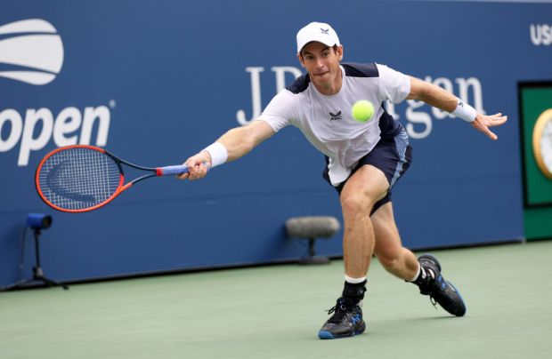NEW YORK, NEW YORK - AUGUST 29: Andy Murray of Great Britain plays a forehand against Corentin Moutet of France during their Men's Singles First Round match on Day Two of the 2023 US Open at the USTA Billie Jean King National Tennis Center on August 29, 2023 in the Flushing neighborhood of the Queens borough of New York City. (Photo by Clive Brunskill/Getty Images)