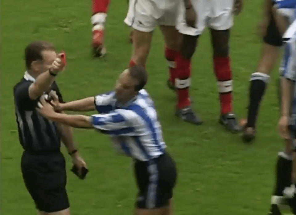 And in a moment of madness, pushed the referee after being sent off