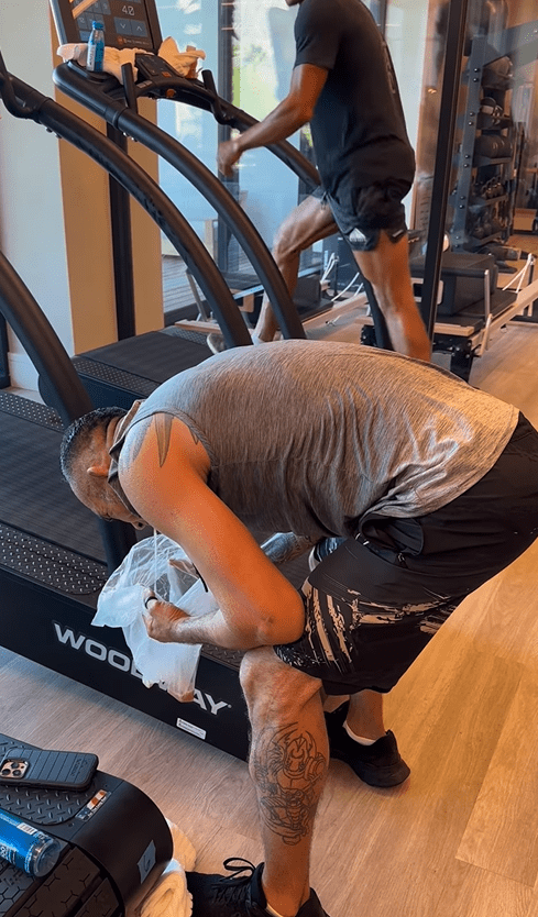 He carried on working out despite having to stop to vomit