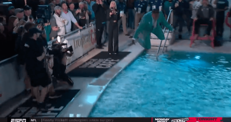 The former QB leaped into the pool inside the stadium while fully clothed
