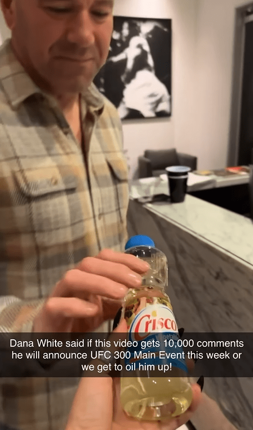 Drama handed White a bottle of oil just in case he had to do the forfeit