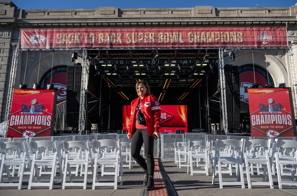 A woman walks near a stage set up to celebrate the Super Bowl LVIII win of the Kansas City Chiefs at Union Station in Kansas City, on February 13, 2024. (Photo by ANDREW CABALLERO-REYNOLDS / AFP) (Photo by ANDREW CABALLERO-REYNOLDS/AFP via Getty Images)