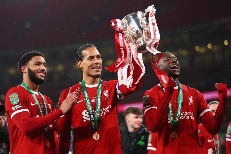 LONDON, ENGLAND - FEBRUARY 25: Liverpool's Virgil van Dijk celebrates with teammates after winning the Carabao Cup Final match between Chelsea and Liverpool at Wembley Stadium on February 25, 2024 in London, England. (Photo by Marc Atkins/Getty Images)